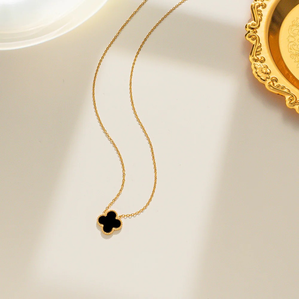 Elegant Gold and Black Clover Necklace